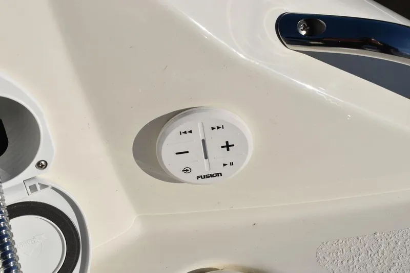 Slide: The Image of Fusion audio control panel on 2024 Stingray 231DC boat. - 22