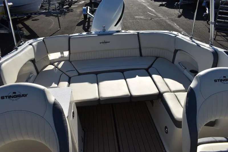 Slide: The Image of 2024 Stingray 231DC boat with spacious seating and modern design. - 36