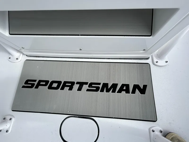 Slide: The Image of 2024 Sportsman Masters 227 Bay Boat deck with logo. - 17