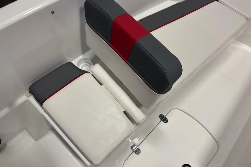 Slide: The Image of 2024 Tahoe T16 boat seating with gray, red, and white upholstery design. - 13