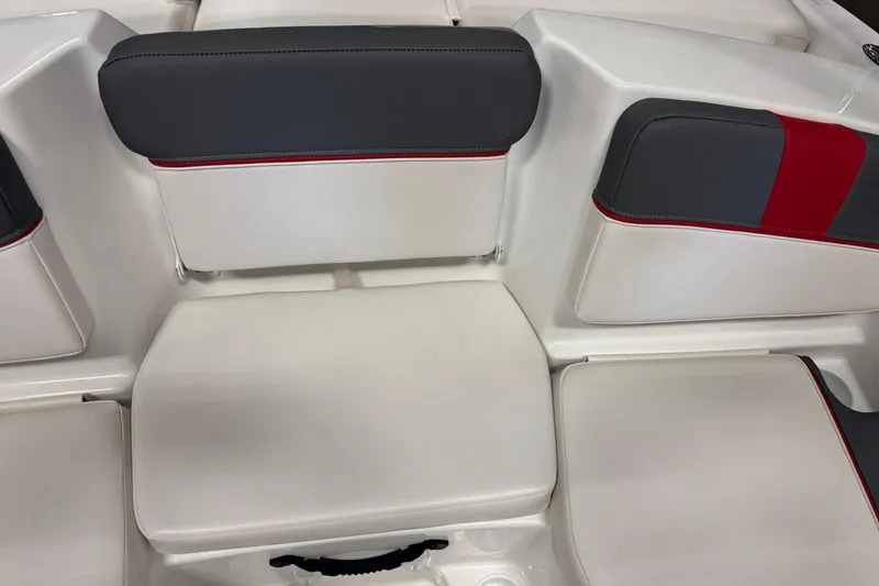 Slide: The Image of 2024 Tahoe T16 boat seating with white, gray, and red upholstery. - 9