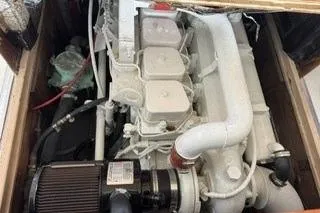 Slide: The Image of 1989 Dyer Downeast engine compartment with visible components and wiring. - 23