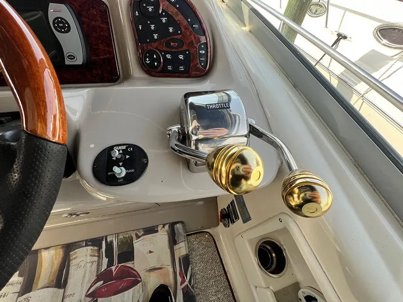 Slide: The Image of Throttle controls on a 2006 Sea Ray 340 Sundancer boat. - 12
