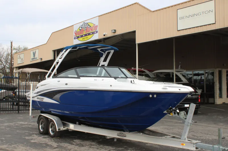 The Image of 2023 Monterey M6 boat on trailer at dealership. - 1
