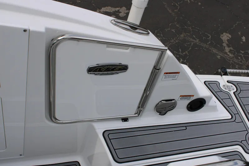 Slide: The Image of 2023 Monterey M6 boat deck with storage compartment and non-slip flooring. - 17