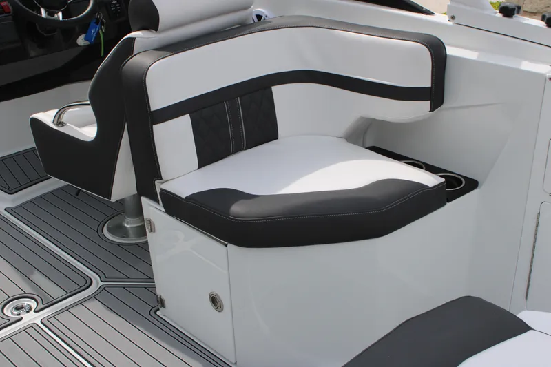 Slide: The Image of 2023 Monterey M6 boat interior with black and white seating and modern design. - 33