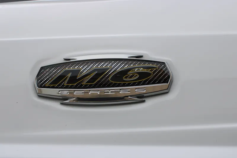 Slide: The Image of 2023 Monterey M6 Series emblem on white surface. - 7