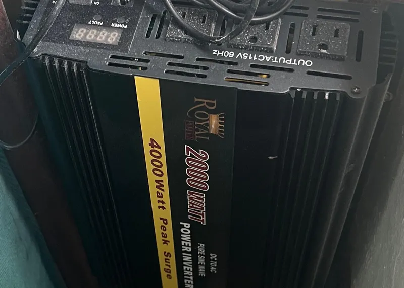 Slide: The Image of CAL T2 1974 model 4000 Watt peak surge power inverter with multiple outlets. - 35