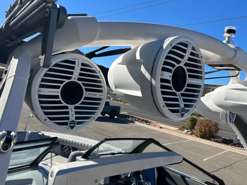 Slide: The Image of 2021 Tigé 25ZX boat with mounted speakers on the wakeboard tower. - 7