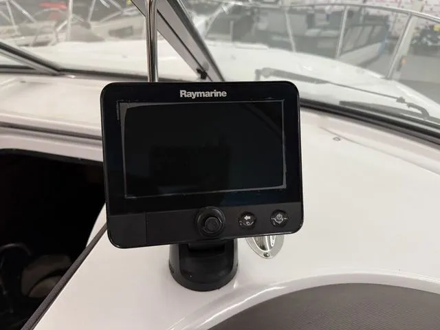 Slide: The Image of Raymarine device on 2014 Cruisers Yachts 275 Express dashboard. - 29