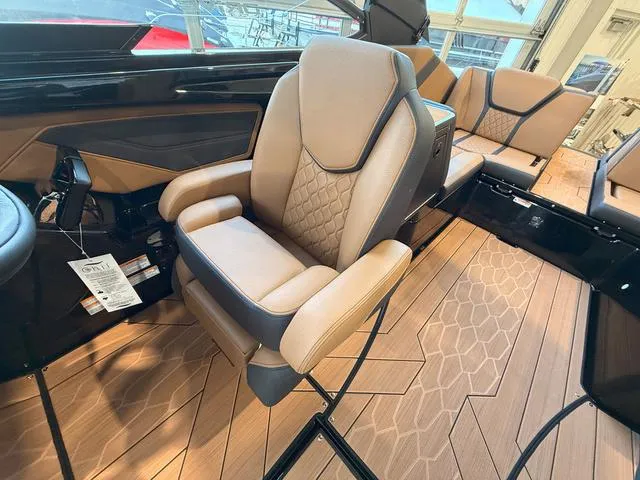Slide: The Image of 2025 Yamaha Boats 255XD interior with luxurious seating and modern design. - 15