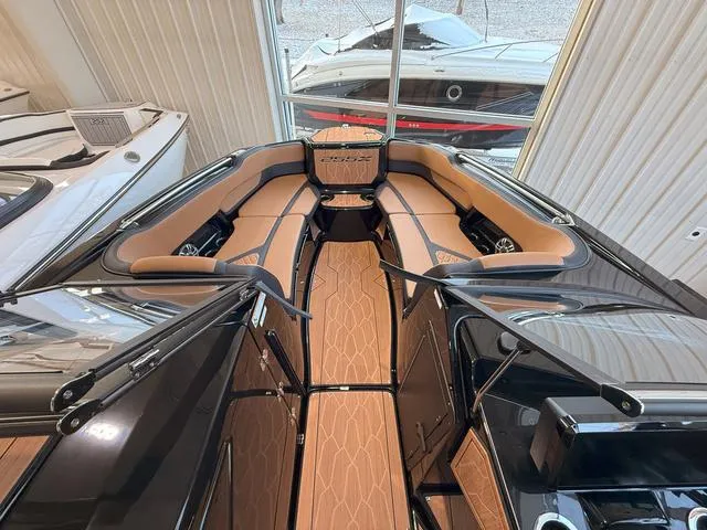 Slide: The Image of 2025 Yamaha Boats 255XD interior with sleek design and luxurious seating. - 21