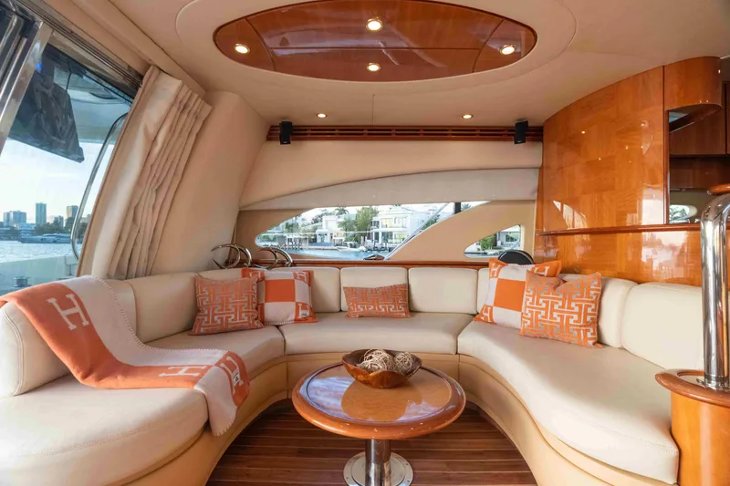 Slide: The Image of Luxurious interior of 2005 Azimut 62 Evolution yacht with elegant seating and decor. - 16