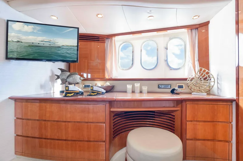 Slide: The Image of Luxurious interior of 2005 Azimut 62 Evolution yacht with elegant wood cabinetry and decor. - 24