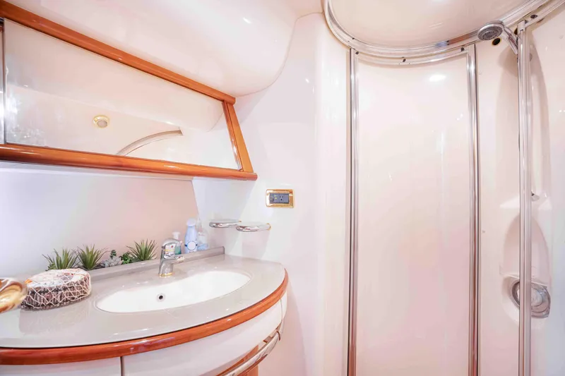 Slide: The Image of Luxurious bathroom in 2005 Azimut 62 Evolution yacht with modern fixtures and elegant design. - 31