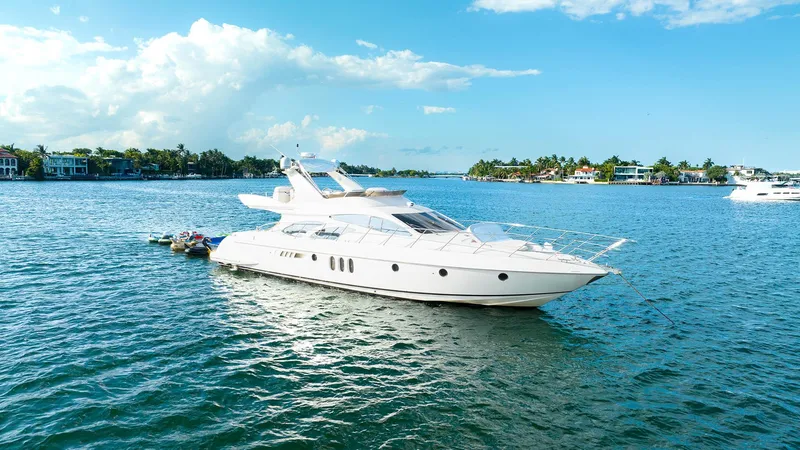 Slide: The Image of 2005 Azimut 62 Evolution yacht cruising on a sunny day. - 33
