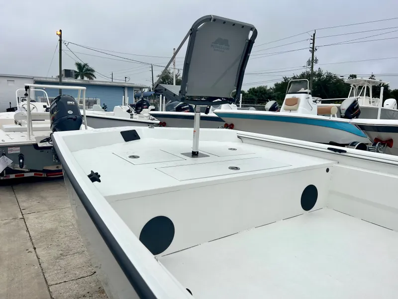 Slide: The Image of 2024 Avid 20 ROGUE CC boat with spacious deck and center console. - 4