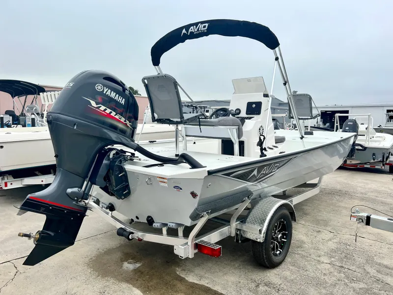 Slide: The Image of 2024 Avid 20 ROGUE CC boat with Yamaha engine on trailer. - 6