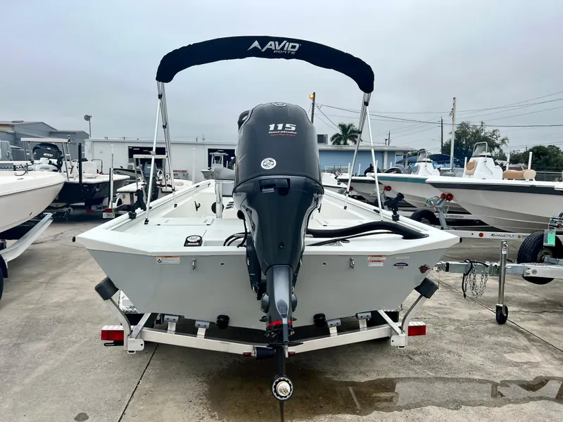 Slide: The Image of 2024 Avid 20 ROGUE CC boat with 115 HP engine on trailer. - 7
