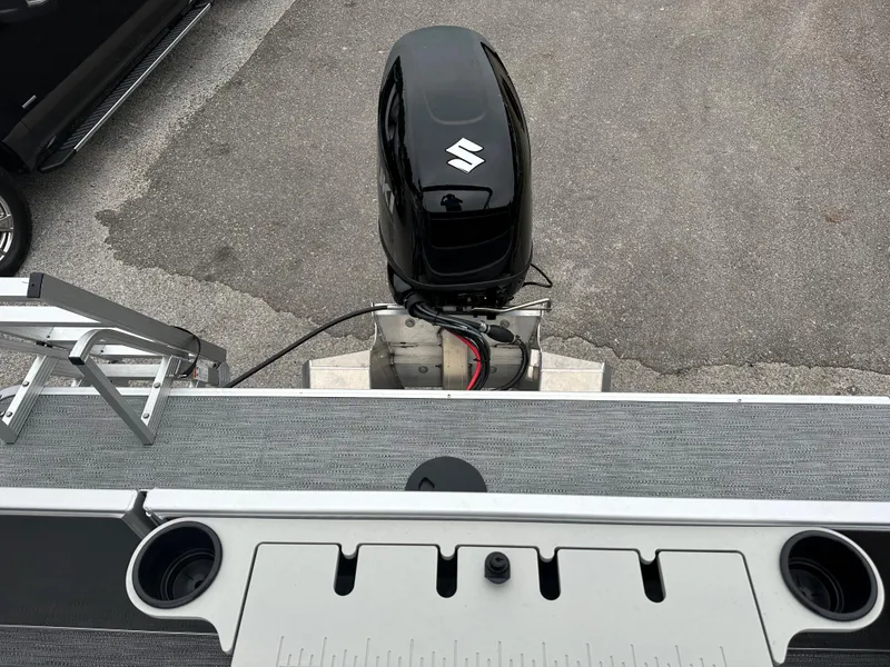 Slide: The Image of Top view of 2024 Sweetwater EX2286FX boat with Suzuki outboard motor. - 11