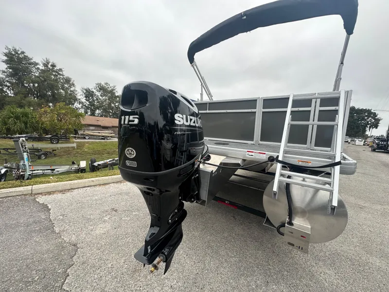 Slide: The Image of Sweetwater EX2286FX 2024 boat with Suzuki 115 outboard motor. - 12