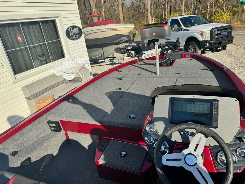 Slide: The Image of 2024 Vexus AVX1880 fishing boat with advanced navigation system and spacious deck. - 6