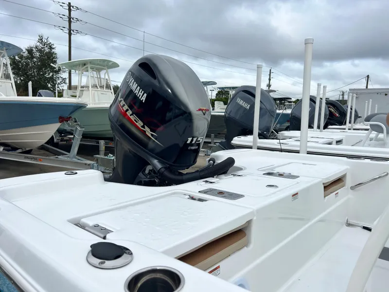 Slide: The Image of 2024 NauticStar 194 Bay boat with Yamaha 115 outboard motor. - 8
