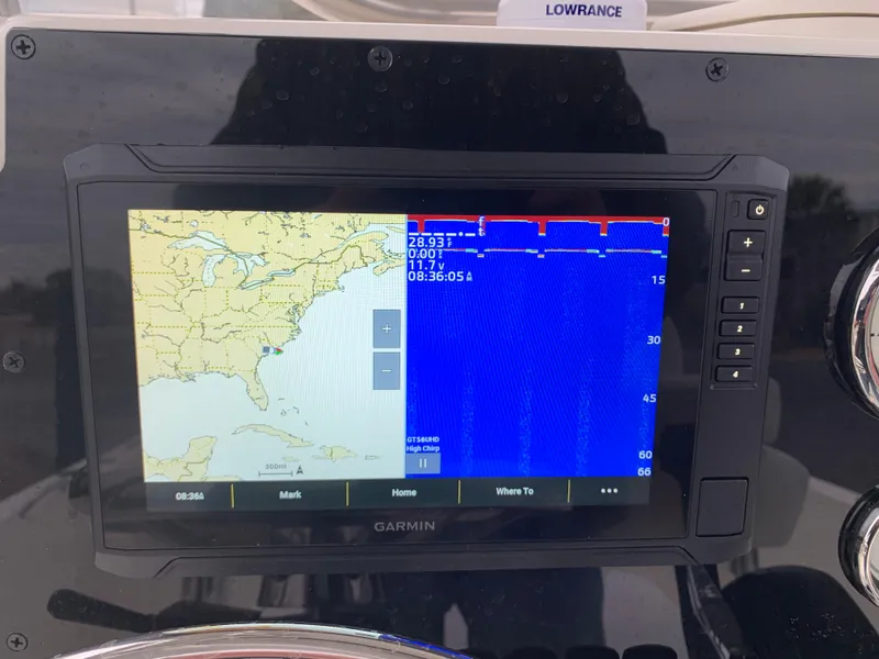 Slide: The Image of Garmin navigation display on 2025 Bulls Bay 2400 boat dashboard. - 17
