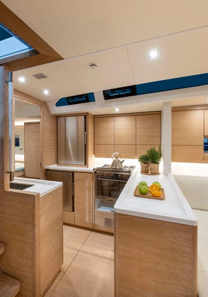Slide: The Image of Luxurious interior of 2025 Solaris 50 yacht with modern kitchen design. - 10