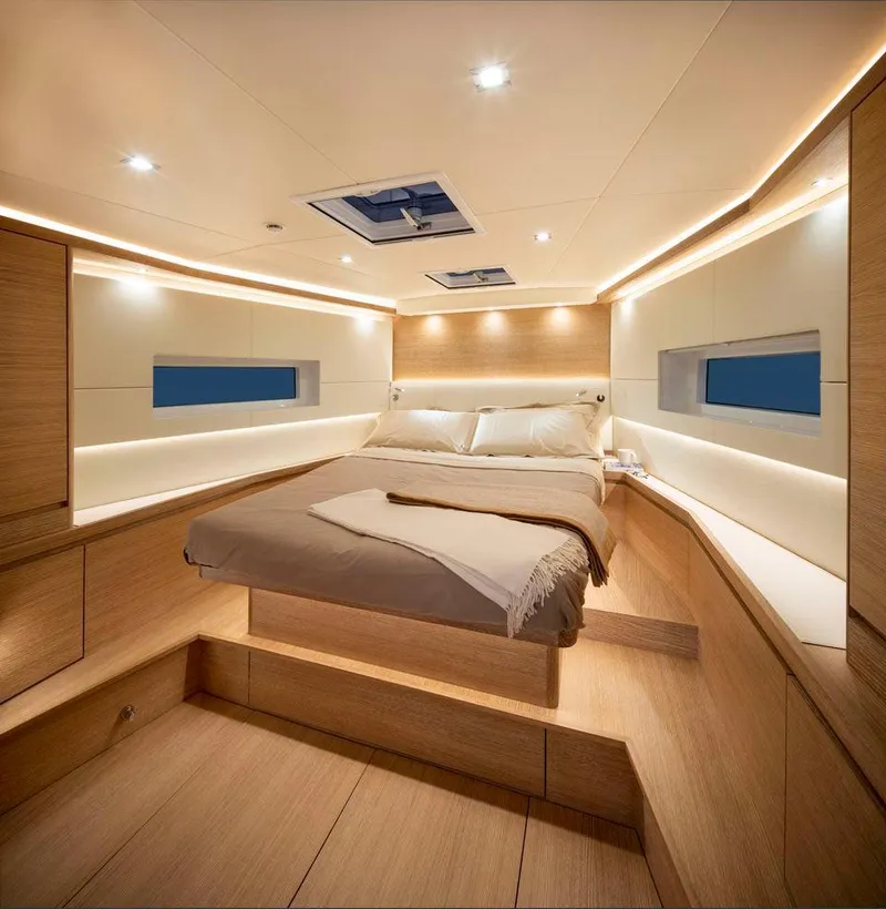 Slide: The Image of Luxurious interior of 2025 Solaris 50 yacht with elegant wood finish and ambient lighting. - 6