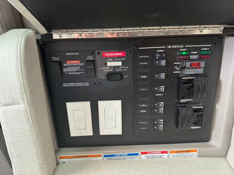 Slide: The Image of Control panel of a 2021 Sea Ray 400 SLX OB boat. - 10