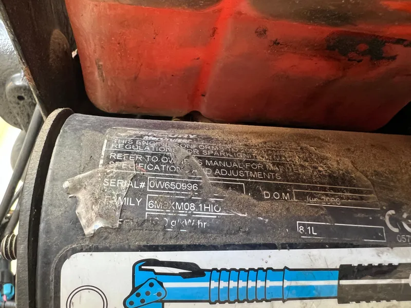 Slide: The Image of Close-up of a 2007 Sea Ray 250 SLX engine serial number and specifications. - 17