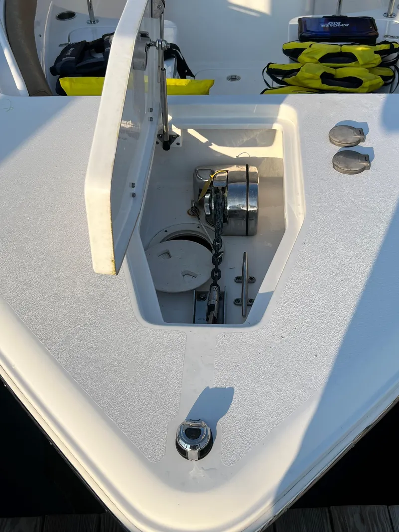 Slide: The Image of 2020 Sea Hunt Gamefish 25 anchor locker and windlass system. - 16