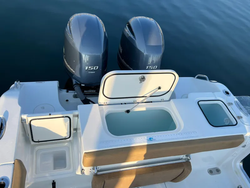 Slide: The Image of 2020 Sea Hunt Gamefish 25 boat with twin Yamaha 150 engines. - 18