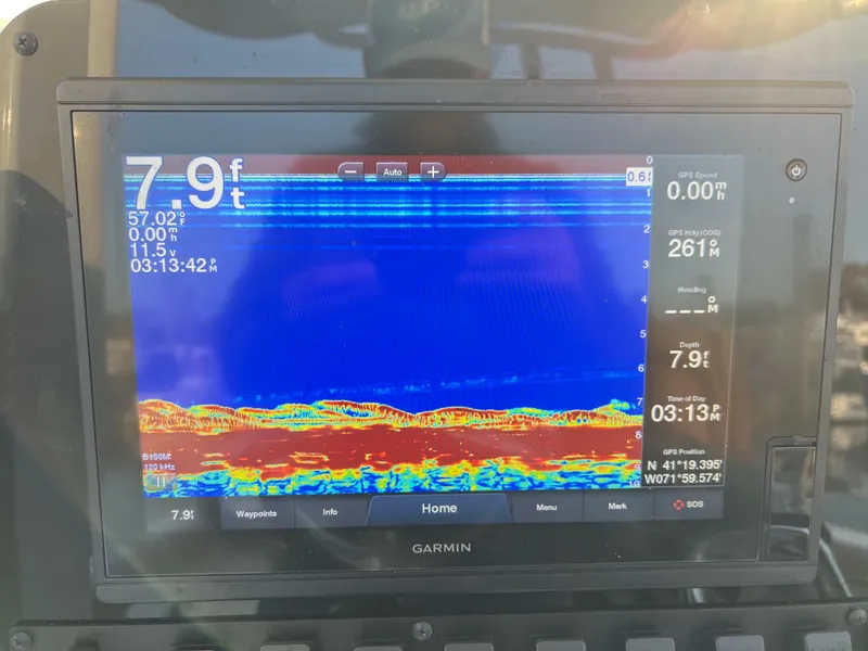 Slide: The Image of Garmin fishfinder display on 2020 Sea Hunt Gamefish 25 showing depth and sonar data. - 26