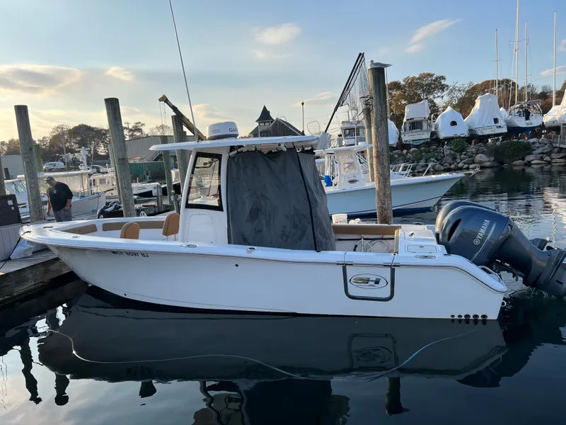 Slide: The Image of 2020 Sea Hunt Gamefish 25 boat docked at marina. - 31