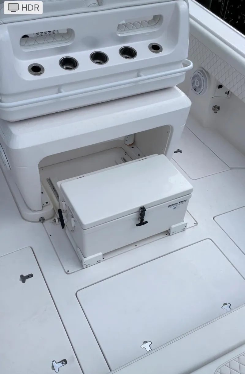 Slide: The Image of 2016 Intrepid 375 Center Console boat deck with storage compartments. - 10