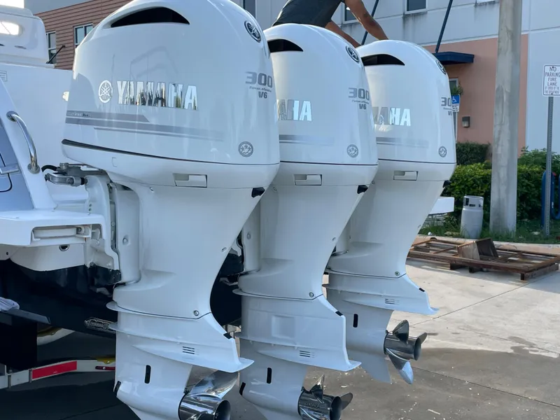 Slide: The Image of Triple Yamaha 300 outboard engines on a 2016 Intrepid 375 Center Console boat. - 17