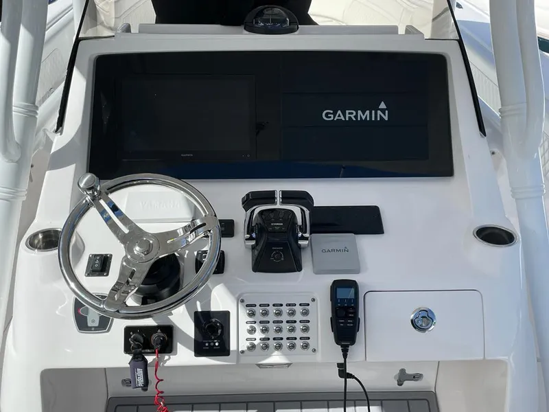 Slide: The Image of 2016 Intrepid 375 Center Console helm with Garmin navigation system. - 22