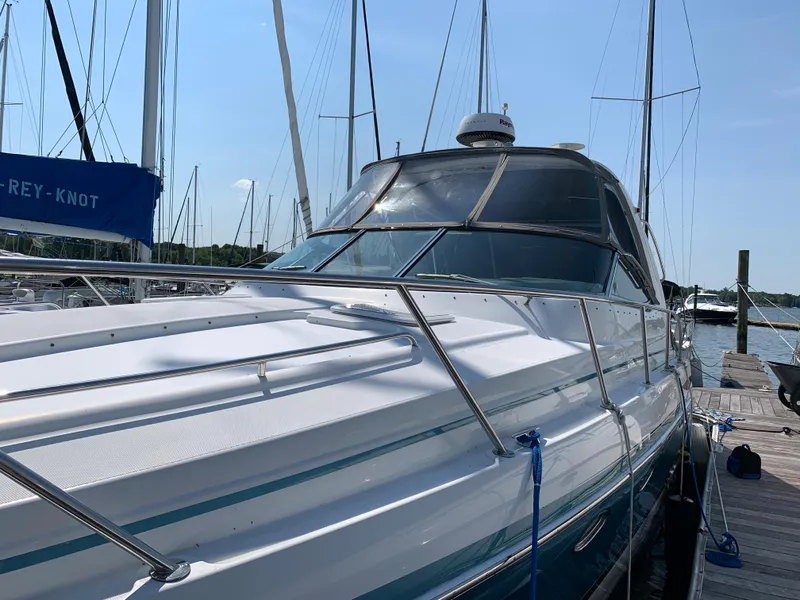 Slide: The Image of 2005 Formula 34 PC yacht docked at marina on a sunny day. - 9