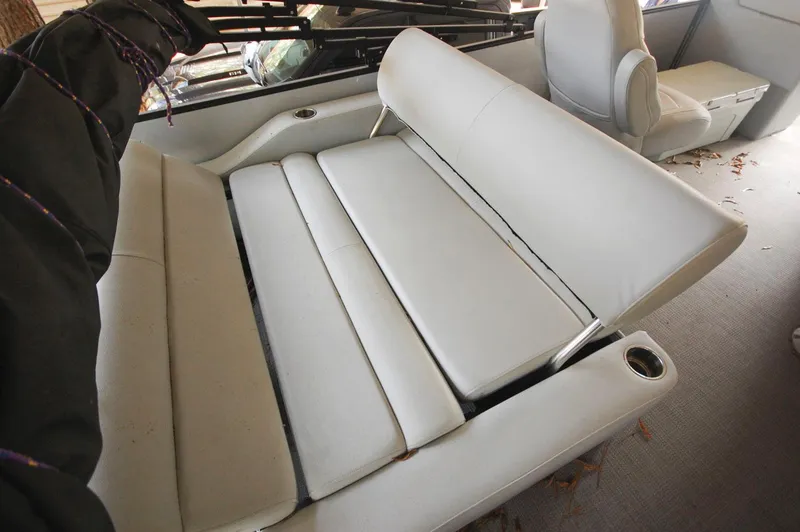Slide: The Image of 2021 Bentley Pontoons 243 Swingback interior seating with white upholstery. - 13