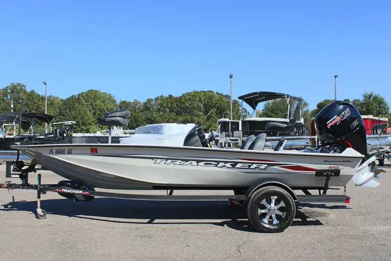 The Image of 2021 Tracker 195 TXW Tournament Edition fishing boat on trailer. - 0
