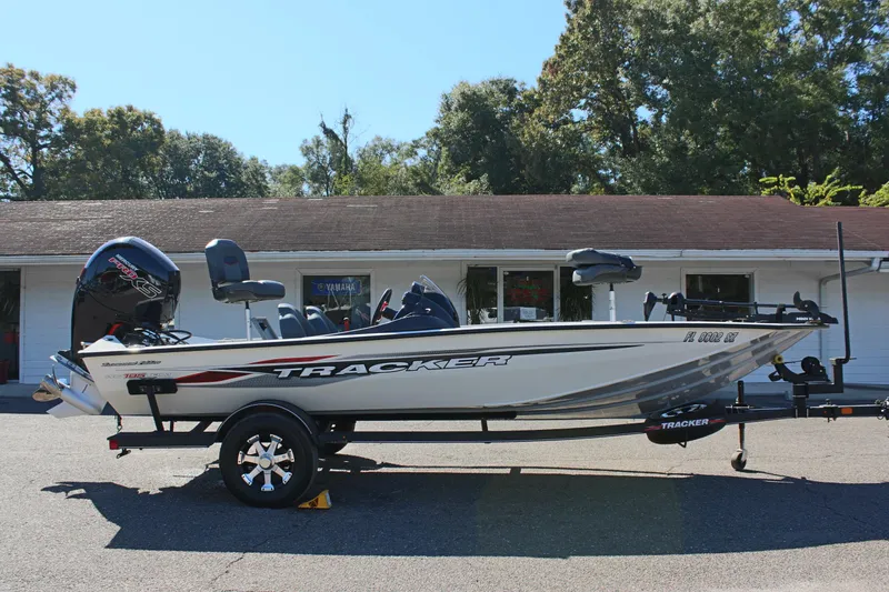 Slide: The Image of 2021 Tracker 195 TXW Tournament Edition fishing boat on trailer. - 4