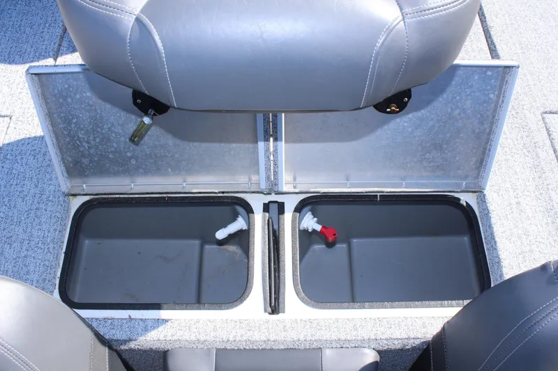 Slide: The Image of 2021 Tracker 195 TXW Tournament Edition boat storage compartments. - 9