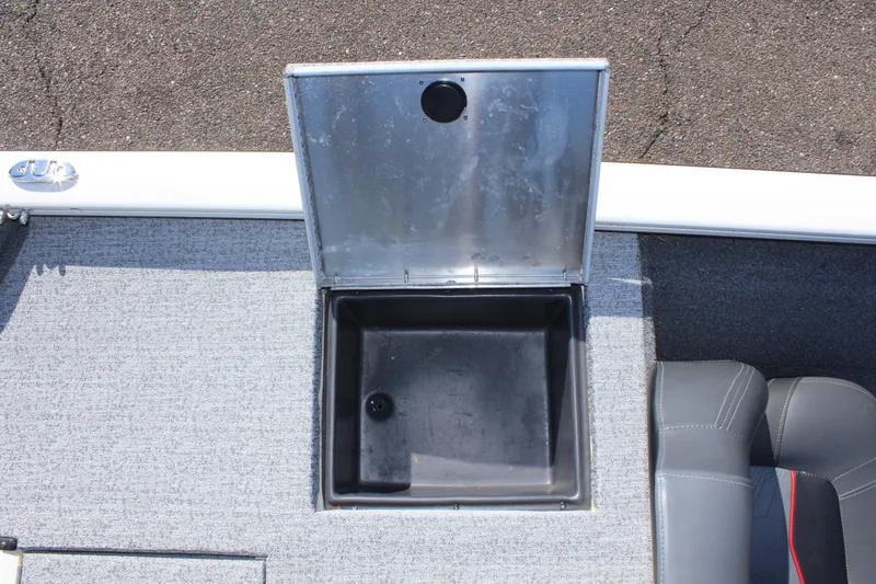 Slide: The Image of Open storage compartment on a 2021 Tracker 195 TXW Tournament Edition boat. - 10
