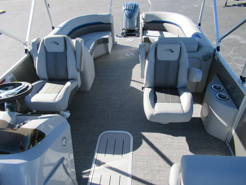 Slide: The Image of 2024 Bennington 22 SXSR pontoon boat interior with plush seating and modern design. - 4
