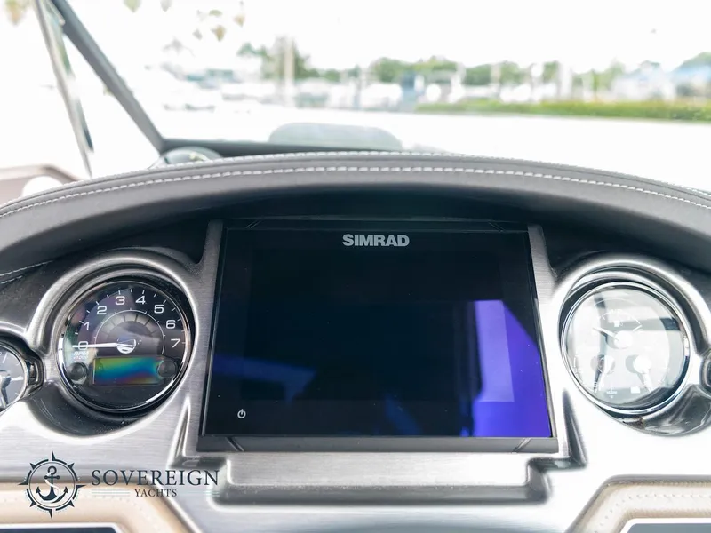 Slide: The Image of Dashboard of 2024 Monterey 275 Super Sport boat with Simrad display. - 15