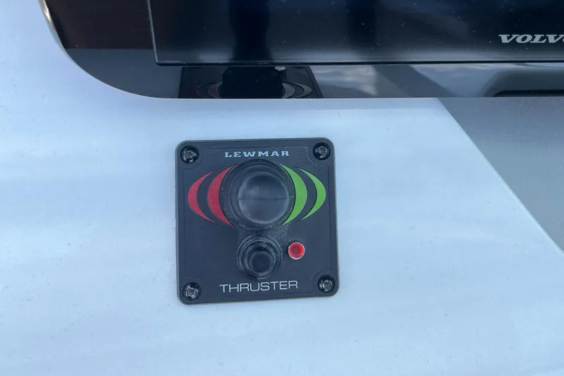 Slide: The Image of Lewmar thruster control panel on a 2024 Regal LS9 boat. - 16