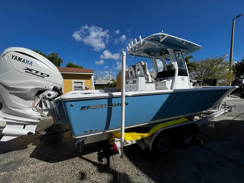 Slide: The Image of 2024 Sportsman Masters 267OE Bay Boat with Yamaha engine on trailer. - 3