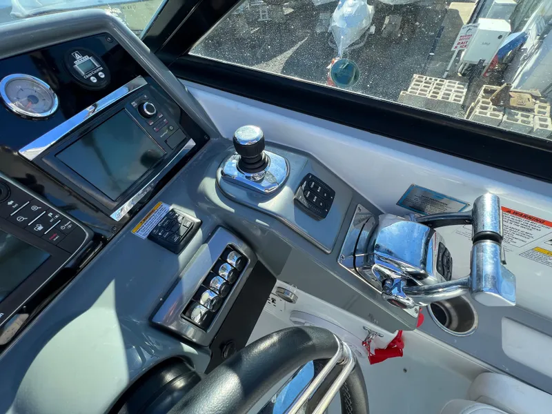 Slide: The Image of Control panel of a 2014 Formula 350 Crossover Bowrider boat. - 11